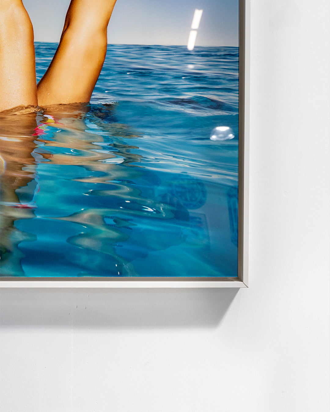 Baldy Art Gallery Group of Legs Protruding Out of Infinity Pool Photograph Print